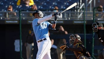 PEORIA, ARIZONA - FEBRUARY 28: Julio Rodríguez #85 of the Seattle Mariners hits a walk-off single in the ninth inning to defeat the San Diego Padres 5-4 during the MLB spring training game at Peoria Sports Complex on February 28, 2021 in Peoria, Arizona. (Photo by Steph Chambers/Getty Images)