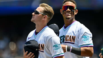 DENVER, CO - JULY 11: Jarred Kelenic #14 and Julio Rodriguez #3 of American League Futures Team and Seattle Mariners look on. (Photo by Dustin Bradford/Getty Images)
