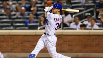 NEW YORK, NY - SEPTEMBER 12: Michael Conforto #30 of the New York Mets in action against the New York Yankees during a game at Citi Field on September 12, 2021 in New York City. (Photo by Rich Schultz/Getty Images)