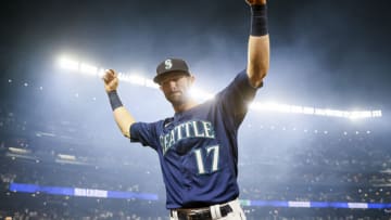 SEATTLE, WASHINGTON - OCTOBER 02: Mitch Haniger #17 of the Seattle Mariners reacts after beating the Los Angeles Angels 6-4 at T-Mobile Park on October 02, 2021 in Seattle, Washington. (Photo by Steph Chambers/Getty Images)