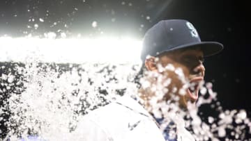 SEATTLE, WASHINGTON - APRIL 22: Julio Rodriguez #44 of the Seattle Mariners is doused with water after the 4-1 win against the Kansas City Royals at T-Mobile Park on April 22, 2022 in Seattle, Washington. (Photo by Abbie Parr/Getty Images)