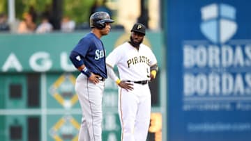 PITTSBURGH, PA - JULY 27: Robinson Cano #22 of the Seattle Mariners talks with Josh Harrison #5 of the Pittsburgh Pirates. (Photo by Joe Sargent/Getty Images) *** Local Caption ***
