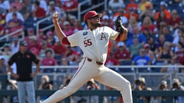 Omaha, NE - JUNE 28: Pitcher Isaiah Campbell #55 of the Arkansas Razorbacks delivers a pitch. He is now a member of the Seattle Mariners organization. (Photo by Peter Aiken/Getty Images)