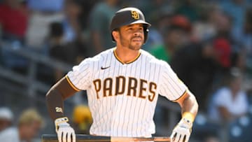 SAN DIEGO, CA - JULY 28: Tommy Pham #28 of the San Diego Padres walks back to the dugout after hitting a fly ball during the eighth inning of a baseball game against the Oakland Athletics at Petco Park on July 28, 2021 in San Diego, California. (Photo by Denis Poroy/Getty Images)
