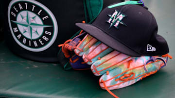 ANAHEIM, CA - SEPTEMBER 25: A glove sits in the Seattle Mariners dugout before a game agains the Los Angeles Angels at Angel Stadium of Anaheim on September 25, 2021 in Anaheim, California. (Photo by John McCoy/Getty Images)