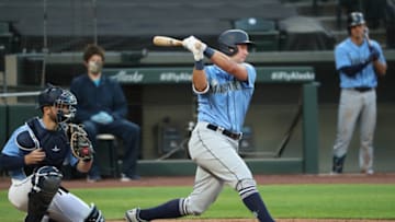 SEATTLE, WASHINGTON - JULY 18: Cal Raleigh of the Mariners swings at a pitch during a summer workouts intrasquad game at T-Mobile Park on July 18, 2020. (Photo by Abbie Parr/Getty Images)