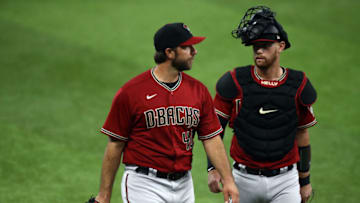 ARLINGTON, TEXAS - JULY 29: (L-R) Madison Bumgarner #40 and Carson Kelly #18 of the Arizona Diamondbacks at Globe Life Field on July 29, 2020 in Arlington, Texas. (Photo by Ronald Martinez/Getty Images)