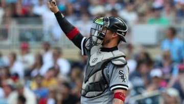 MINNEAPOLIS, MN - JULY 5: Yasmani Grandal #24 of the Chicago White Sox signals to the infield against the Minnesota Twins in the third inning of the game at Target Field on July 5, 2021 in Minneapolis, Minnesota. The Twins defeated the White Sox 8-5. (Photo by David Berding/Getty Images)