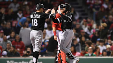 BOSTON, MA - MAY 6: Luis Robert #88 celebrates with teammate AJ Pollock #18 of the Chicago White Sox after hitting a two run home run in the third inning against the Boston Red Sox at Fenway Park on May 6, 2022 in Boston, Massachusetts. (Photo by Kathryn Riley/Getty Images)