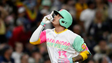 SAN DIEGO, CA - JULY 29: Manny Machado #13 of the San Diego Padres celebrates after hitting a solo home run during the fifth inning of a baseball game against the Minnesota Twins at Petco Park on July 29, 2022 in San Diego, California. (Photo by Denis Poroy/Getty Images)