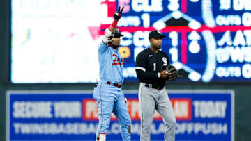 MINNEAPOLIS, MN - SEPTEMBER 27: Luis Arraez #2 of the Minnesota Twins celebrates his double as Elvis Andrus #1 of the Chicago White Sox looks on in the third inning of the game at Target Field on September 27, 2022 in Minneapolis, Minnesota. (Photo by David Berding/Getty Images)