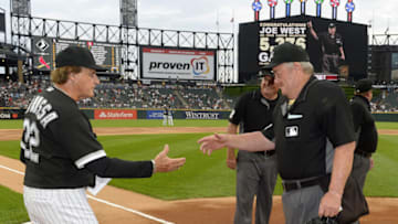CHICAGO - MAY 25: Home plate umpire Joe West #22 greets White Sox Manager Tony La Russa #22 prior to the game between the Chicago White Sox and St. Louis Cardinals on May 25, 2021 at Guaranteed Rate Field in Chicago, Illinois. West set a Major League Baseball record during this game by umpiring in his 5,376 game. (Photo by Ron Vesely/Getty Images)