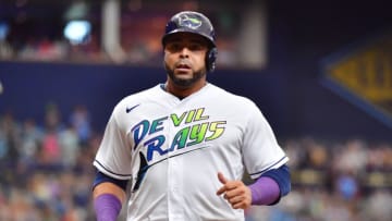 ST PETERSBURG, FLORIDA - AUGUST 21: Nelson Cruz #23 of the Tampa Bay Rays scores after being batted in by Wander Franco #5 in the first inning against the Chicago White Sox at Tropicana Field on August 21, 2021 in St Petersburg, Florida. (Photo by Julio Aguilar/Getty Images)