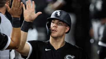 CHICAGO, ILLINOIS - OCTOBER 01: Gavin Sheets #32 of the Chicago White Sox celebrates with this teammates after scoring a run during the fourth inning in the game against the Detroit Tigers at Guaranteed Rate Field on October 01, 2021 in Chicago, Illinois. (Photo by Justin Casterline/Getty Images)