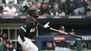 CHICAGO, ILLINOIS - OCTOBER 12: Luis Robert #88 of the Chicago White Sox runs after batting against the Houston Astros at Guaranteed Rate Field on October 12, 2021 in Chicago, Illinois. The Astros defeated the White Sox 10-1. (Photo by Jonathan Daniel/Getty Images)