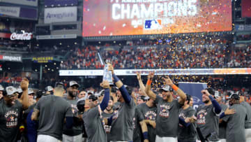 HOUSTON, TEXAS - OCTOBER 22: The Houston Astros celebrate after defeating the Boston Red Sox 5-0 in Game Six of the American League Championship Series to advance to the World Series at Minute Maid Park on October 22, 2021 in Houston, Texas. (Photo by Elsa/Getty Images)