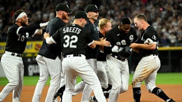 CHICAGO - MAY 14: Luis Robert #88 of the Chicago White Sox is mobbed by teammates after hitting a walk-off game winning single during the bottom of the ninth inning against the New York Yankees on May 14, 2022 at Guaranteed Rate Field in Chicago, Illinois. (Photo by Ron Vesely/Getty Images)