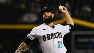 PHOENIX, ARIZONA - JULY 07: Dallas Keuchel #60 of the Arizona Diamondbacks delivers a first inning pitch against the Colorado Rockies at Chase Field on July 07, 2022 in Phoenix, Arizona. (Photo by Norm Hall/Getty Images)