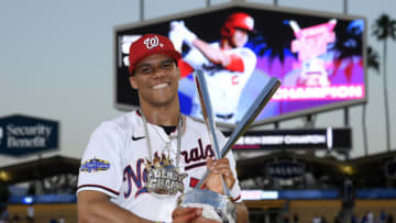 LOS ANGELES, CALIFORNIA - JULY 18: National League All-Star Juan Soto #22 of the Washington Nationals poses with the 2022 T-Mobile Home Run Derby trophy after winning the event at Dodger Stadium on July 18, 2022 in Los Angeles, California. (Photo by Kevork Djansezian/Getty Images)