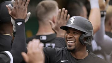 OAKLAND, CALIFORNIA - SEPTEMBER 10: Elvis Andrus #1 of the Chicago White Sox is congratulated by teammates after he hit a three-run home run against the Oakland Athletics in the top of the second inning at RingCentral Coliseum on September 10, 2022 in Oakland, California. (Photo by Thearon W. Henderson/Getty Images)