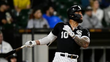 CHICAGO, ILLINOIS - OCTOBER 04: Yoan Moncada #10 of the Chicago White Sox hits an RBI double in the third inning against the Minnesota Twins at Guaranteed Rate Field on October 04, 2022 in Chicago, Illinois. (Photo by Quinn Harris/Getty Images)