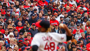 CLEVELAND, OHIO - OCTOBER 07: A fan dressed as Santa Claus looks on as Emmanuel Clase #48 of the Cleveland Guardians pitches against the the Tampa Bay Rays during Game One of the Wild Card Series at Progressive Field on October 07, 2022 in Cleveland, Ohio. (Photo by Patrick Smith/Getty Images)