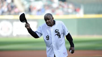 CHICAGO, IL - APRIL 26: Former Chicago White Sox player Minnie Minoso throws out the first pitch before the game between the Chicago White Sox and the Tampa Bay Rays on April 26, 2014 at U.S. Cellular Field in Chicago, Illinois. (Photo by David Banks/Getty Images)