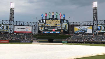 CHICAGO, IL - JUNE 29: A tarp cover the field as the start of the game between the Chicago White Sox and the New York Yankees is delayed because of the weather on June 29, 2017 at Guaranteed Rate Field in Chicago, Illinois. (Photo by David Banks/Getty Images)