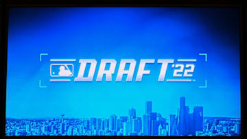 SEATTLE, WASHINGTON - JULY 17: A general view of the MLB Draft '22 logo on the TV monitors in the Seattle Mariners interview room before the MLB Draft at T-Mobile Park on July 17, 2022 in Seattle, Washington. (Photo by Alika Jenner/Getty Images)