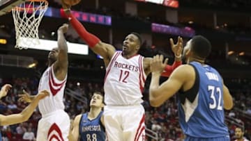 Jan 13, 2016; Houston, TX, USA; Houston Rockets center Dwight Howard (12) attempts to get a rebound during the fourth quarter against the Minnesota Timberwolves at Toyota Center. The Rockets won 107-104. Mandatory Credit: Troy Taormina-USA TODAY Sports