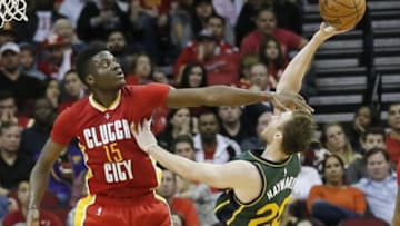 Jan 7, 2016; Houston, TX, USA; Utah Jazz forward Gordon Hayward (20) is fouled while shooting against Houston Rockets forward Clint Capela (15) in the second half at Toyota Center. Rockets won 103 to 94. Mandatory Credit: Thomas B. Shea-USA TODAY Sports