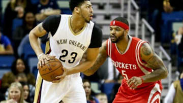 Jan 25, 2016; New Orleans, LA, USA; New Orleans Pelicans forward Anthony Davis (23) is defended by Houston Rockets center Josh Smith (5) during the first quarter of a game at the Smoothie King Center. Mandatory Credit: Derick E. Hingle-USA TODAY Sports