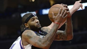 Jan 16, 2016; Los Angeles, CA, USA; Los Angeles Clippers center Josh Smith (5) grabs a rebound from Sacramento Kings center Kosta Koufos (41) during the second quarter at Staples Center. Mandatory Credit: Robert Hanashiro-USA TODAY Sports