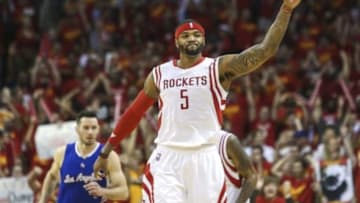 May 17, 2015; Houston, TX, USA; Houston Rockets forward Josh Smith (5) reacts after making a basket during the third quarter against the Los Angeles Clippers in game seven of the second round of the NBA Playoffs at Toyota Center. Mandatory Credit: Troy Taormina-USA TODAY Sports