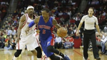 Jan 20, 2016; Houston, TX, USA; Detroit Pistons guard Kentavious Caldwell-Pope (5) dribbles againast Houston Rockets guard Jason Terry (31) in the second half at Toyota Center. Pistons won 123 to 114. Mandatory Credit: Thomas B. Shea-USA TODAY Sports