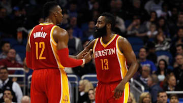 Jan 14, 2015; Orlando, FL, USA; Houston Rockets center Dwight Howard (12) and guard James Harden (13) talk against the Orlando Magic during the second quarter at Amway Center. Mandatory Credit: Kim Klement-USA TODAY Sports