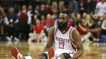 Jan 10, 2016; Houston, TX, USA; Houston Rockets guard James Harden (13) sits on the court after a play during the fourth quarter against the Indiana Pacers at Toyota Center. Mandatory Credit: Troy Taormina-USA TODAY Sports