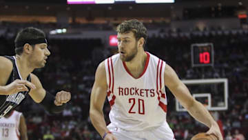 Mar 17, 2015; Houston, TX, USA; Houston Rockets forward Donatas Motiejunas (20) dribbles the ball during the first half against the Orlando Magic at Toyota Center. The Rockets defeated the Magic 107-94. Mandatory Credit: Troy Taormina-USA TODAY Sports