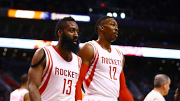 Jan 23, 2015; Phoenix, AZ, USA; Houston Rockets guard James Harden (13) and center Dwight Howard (12) in the first quarter against the Phoenix Suns at US Airways Center. Mandatory Credit: Mark J. Rebilas-USA TODAY Sports