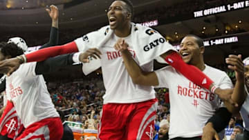 Mar 9, 2016; Philadelphia, PA, USA; Houston Rockets center Dwight Howard (12) and teammates celebrate from the bench after the Rockets