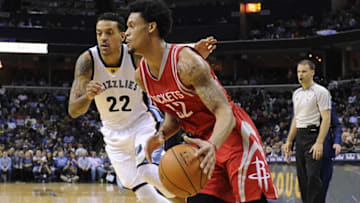 Nov 20, 2015; Memphis, TN, USA; Memphis Grizzlies forward Matt Barnes (22) guards Houston Rockets guard K.J. McDaniels (32) during the second half at FedExForum. Memphis Grizzlies beat Houston Rockets 96-84. Mandatory Credit: Justin Ford-USA TODAY Sports