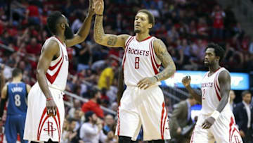 Mar 18, 2016; Houston, TX, USA; Houston Rockets forward Michael Beasley (8) celebrates with guard James Harden (13) after making a basket during the fourth quarter against the Minnesota Timberwolves at Toyota Center. The Rockets won 116-111. Mandatory Credit: Troy Taormina-USA TODAY Sports