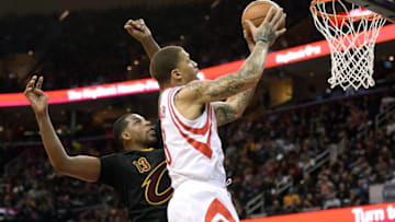Mar 29, 2016; Cleveland, OH, USA; Houston Rockets forward Michael Beasley (8) drives to the basket as Cleveland Cavaliers center Tristan Thompson (13) defends during the second quarter at Quicken Loans Arena. Mandatory Credit: Ken Blaze-USA TODAY Sports