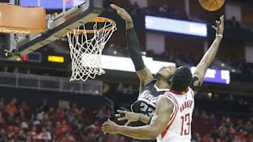 Dec 5, 2015; Houston, TX, USA; Sacramento Kings guard Ben McLemore (23) and Houston Rockets guard James Harden (13) compete for a rebound in the second half at Toyota Center. Rockets won 120-111. Mandatory Credit: Thomas B. Shea-USA TODAY Sports
