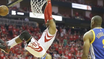 Apr 24, 2016; Houston, TX, USA; Houston Rockets center Dwight Howard (12) dunks against the Golden State Warriors in the second quarter in game four of the first round of the NBA Playoffs at Toyota Center. Mandatory Credit: Thomas B. Shea-USA TODAY Sports