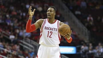Mar 23, 2016; Houston, TX, USA; Houston Rockets center Dwight Howard (12) calls to a teammate during a play in the third quarter against the Utah Jazz at Toyota Center. The Jazz won 89-87. Mandatory Credit: Troy Taormina-USA TODAY Sports