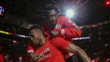 Apr 3, 2016; Houston, TX, USA; Houston Rockets guard Patrick Beverley (2) jumps on the back of center Dwight Howard (12) before a game against the Oklahoma City Thunder at Toyota Center. Mandatory Credit: Troy Taormina-USA TODAY Sports