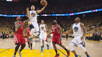 April 16, 2016; Oakland, CA, USA; Golden State Warriors guard Stephen Curry (30) shoots the basketball against Houston Rockets center Josh Smith (5) during the first quarter in game one of the first round of the NBA Playoffs at Oracle Arena. Mandatory Credit: Kyle Terada-USA TODAY Sports