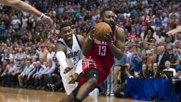 Apr 6, 2016; Dallas, TX, USA; Houston Rockets guard James Harden (13) drives to the basket past Dallas Mavericks guard Wesley Matthews (23) during the second half at the American Airlines Center. The Mavericks defeat the Rockets 88-86. Mandatory Credit: Jerome Miron-USA TODAY Sports