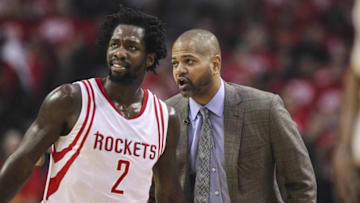 Apr 21, 2016; Houston, TX, USA; Houston Rockets head coach J.B. Bickerstaff talks with guard Patrick Beverley (2) during the first quarter against the Golden State Warriors in game three of the first round of the NBA Playoffs at Toyota Center. Mandatory Credit: Troy Taormina-USA TODAY Sports